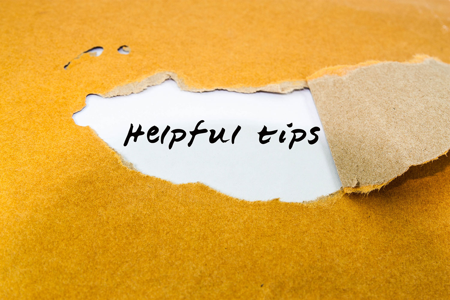 Helpful tips under yellow paper